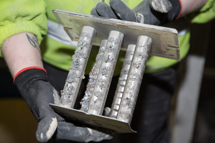 Ferrous metal in recycled plastic captured on Tube Magnets